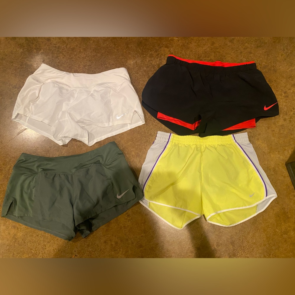 4 pair of Nike shorts size Medium